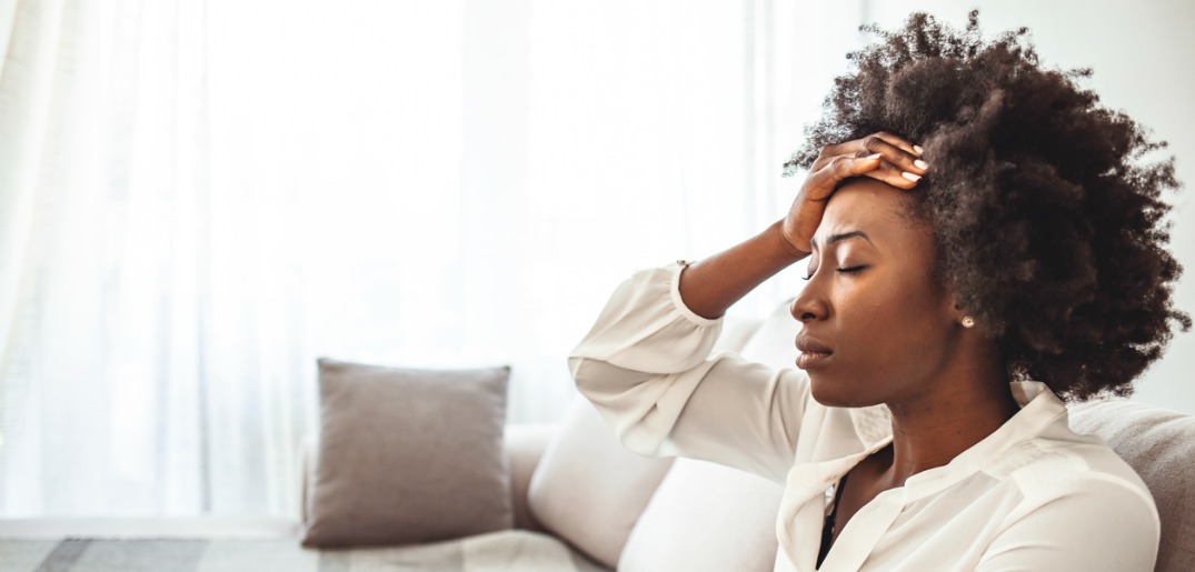 young-woman-headache-id1276385699.jpg