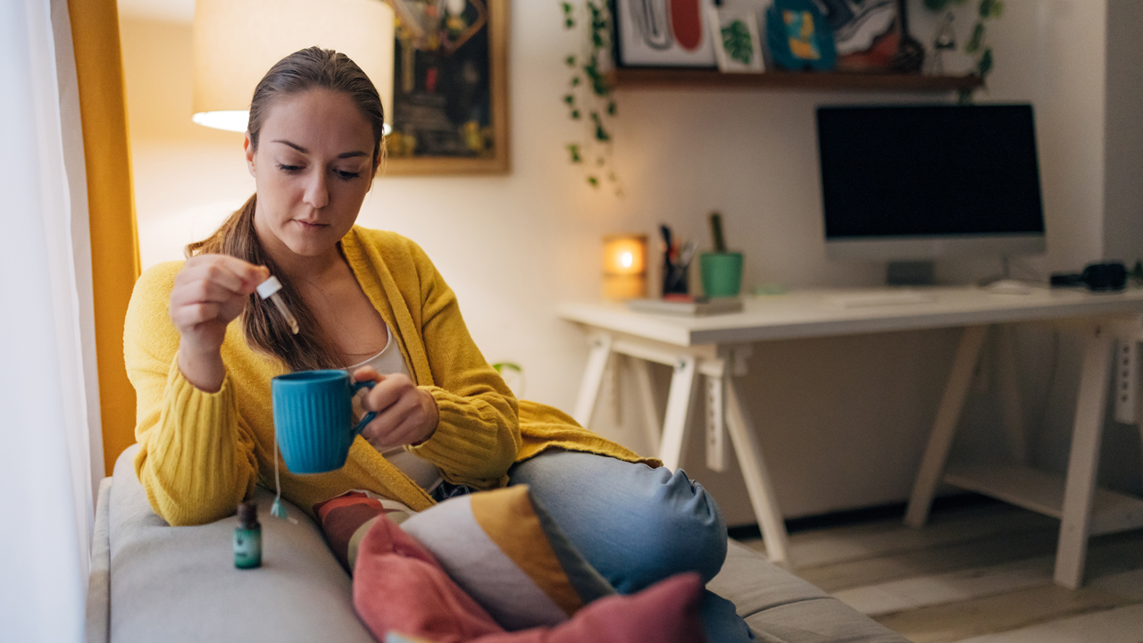 woman cbd oil tea.jpg