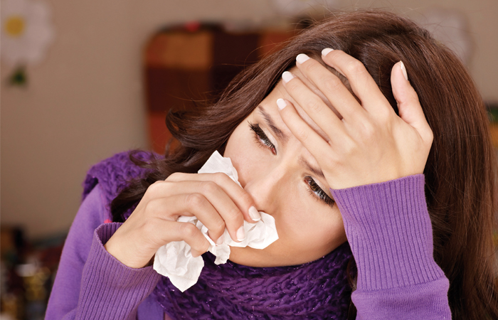 flu_tissues_woman.jpg