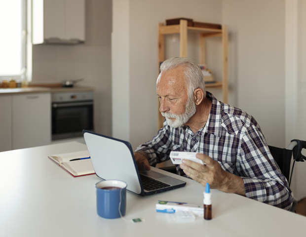 man checking medication computer_s.jpg