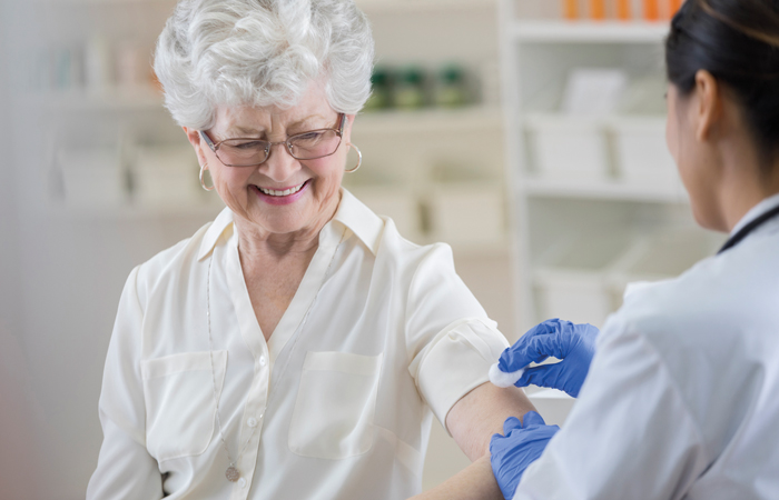 eldery woman flu vaccine.jpg