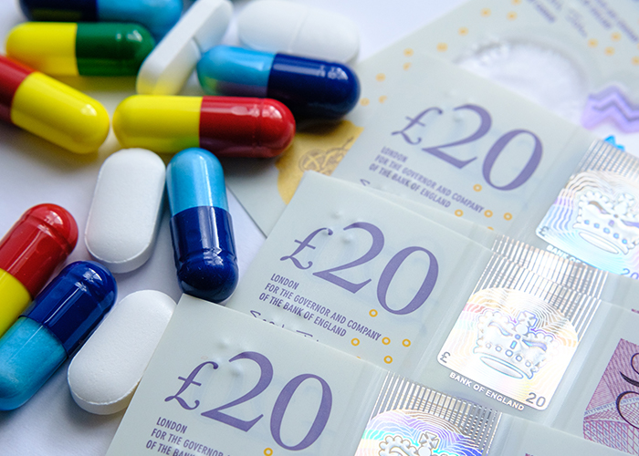 money medicine pills tablet pound notes.jpg