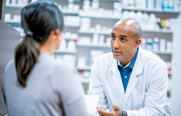 pharmacist explaining customers.jpg