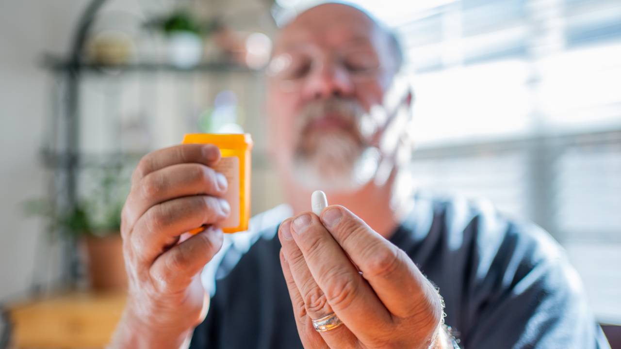 man-taking-pill-summary