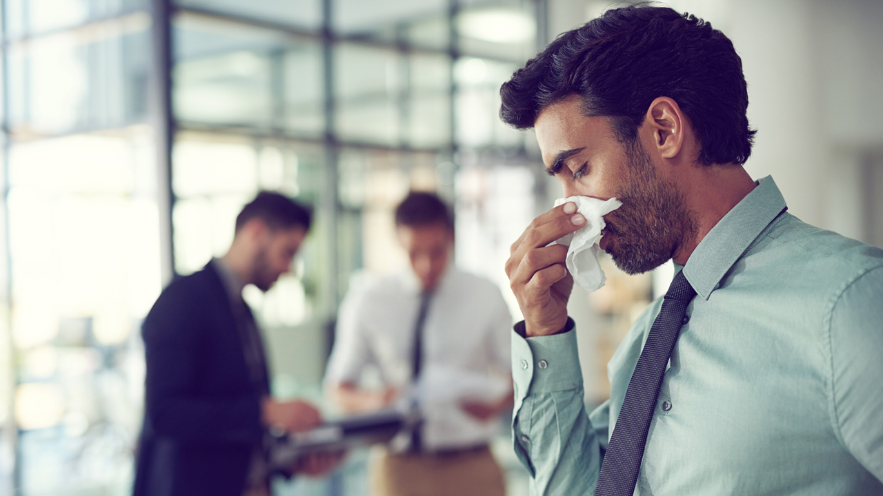 man sneezing.jpg