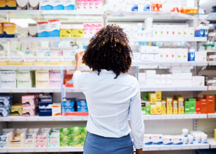 pharmacist organising shelves.jpg