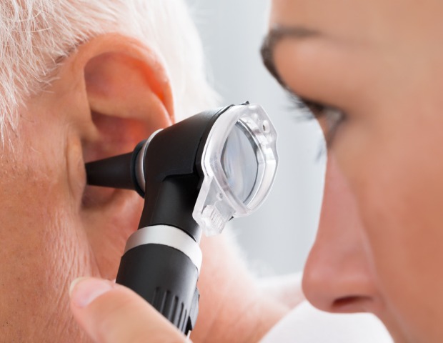 examining-ear-id845307818b.jpg